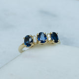Sapphire trilogy ring with diamonds 14 carat gold