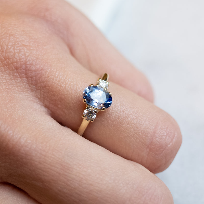 Oval sapphire trilogy rings with natural diamonds