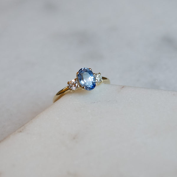 Oval sapphire trilogy rings with natural diamonds