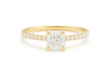 cushion cut diamond ring with pave set diamonds on ring