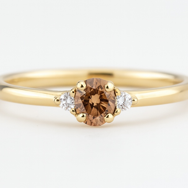 3 stone ring brown diamond with white side diamonds in low setting