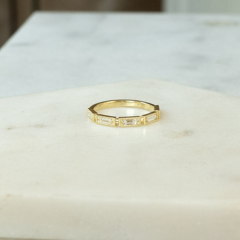 Marie brand baguette diamonds 14k gold