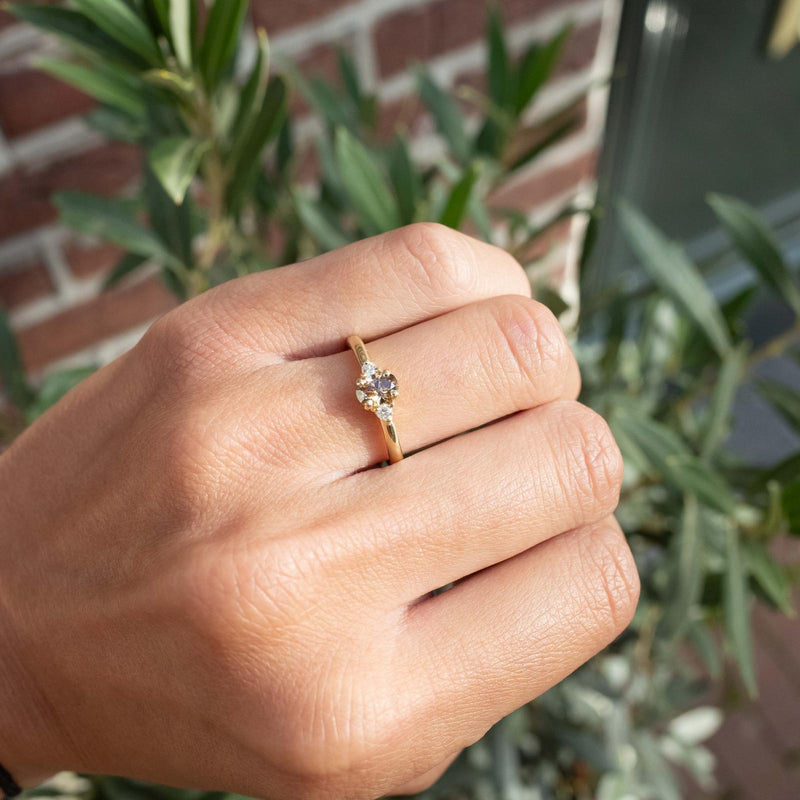 3 stone ring brown diamond with white side diamonds in low setting
