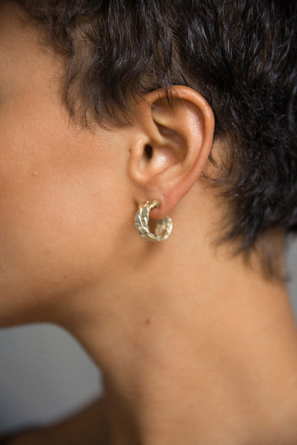 Ear with Melanie Pigeaud caesar earring in 14k gold