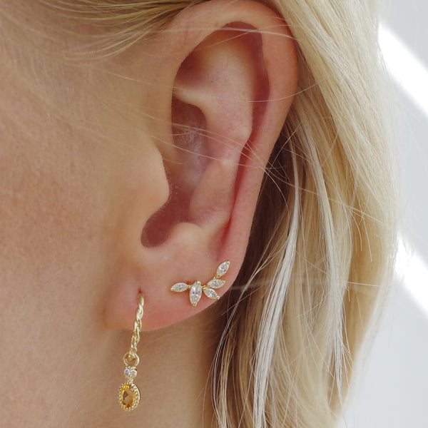 Ear with rope earring with citrine stone in 9k gold and Melanie Pigeaud zirconia studs leaf earring in 9k gold
