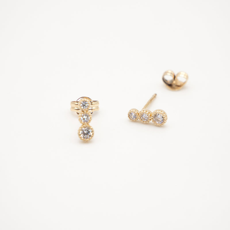 Melanie Pigeaud zirconia round dots earrings in 9k gold